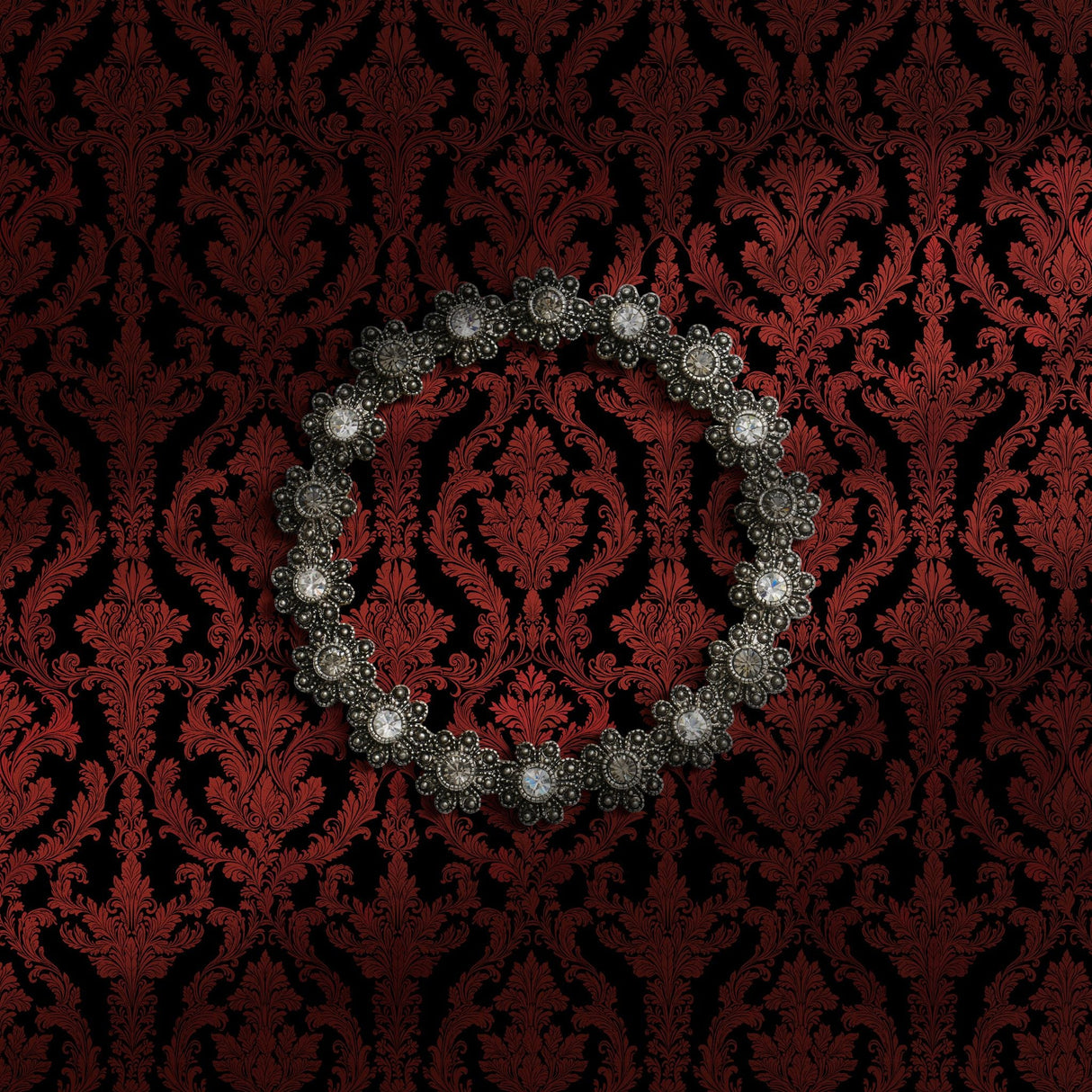 Dark and moody black and red damask wallpaper.