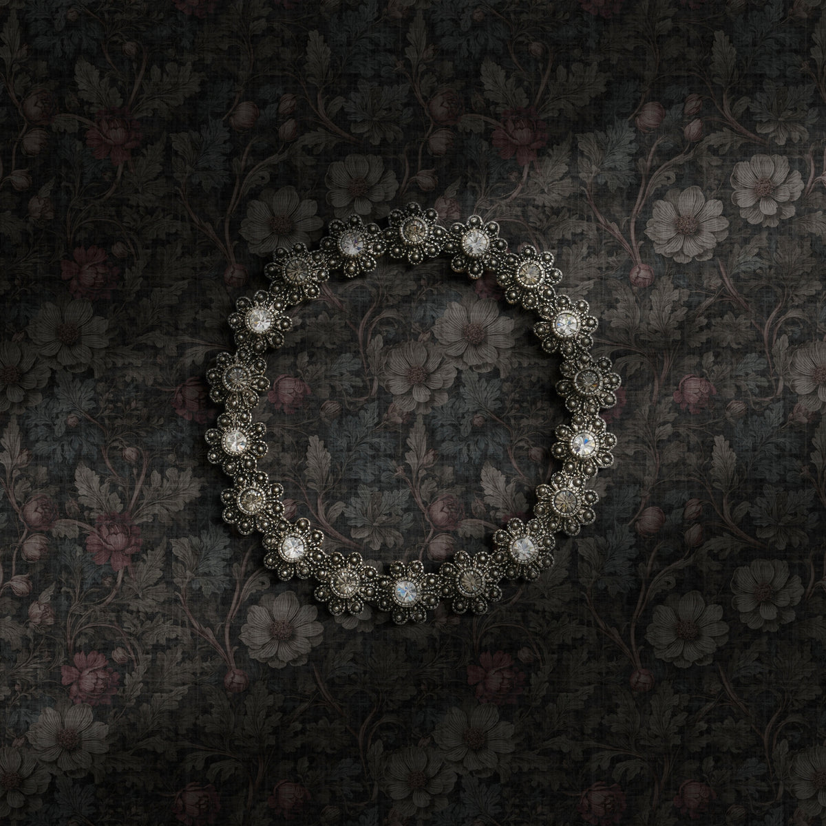 Moody gray dark academia floral wallpaper.