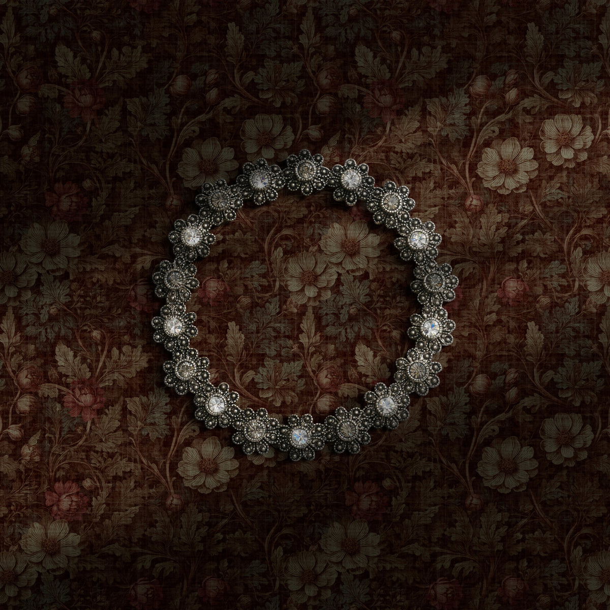 Warm-toned moody dark academia floral wallpaper.