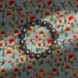 Pastel blue tropical floral wallpaper.