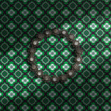 Bright green and dark purple retro tiled wallpaper.