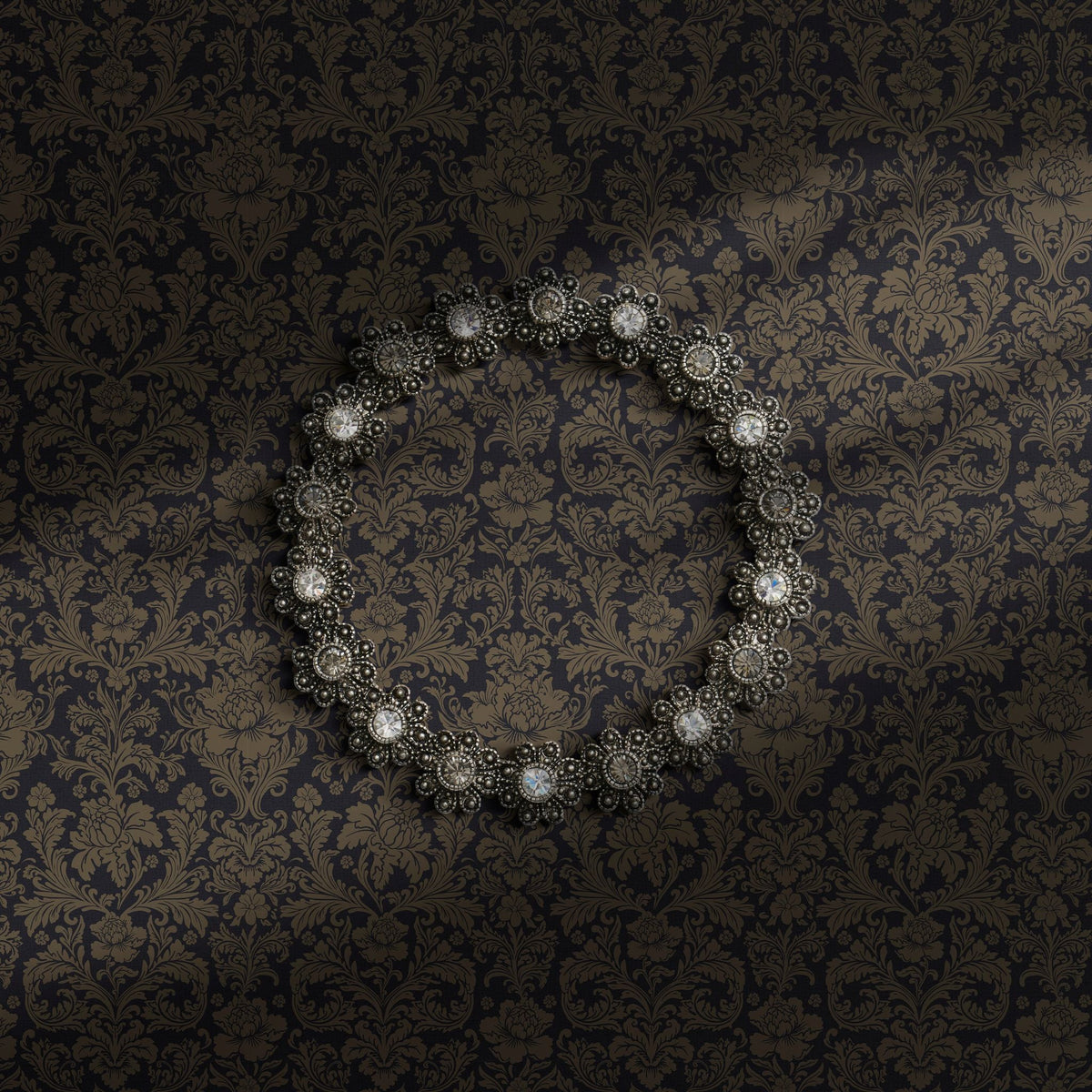 Brown damask wallpaper on a moody blue/gray background.