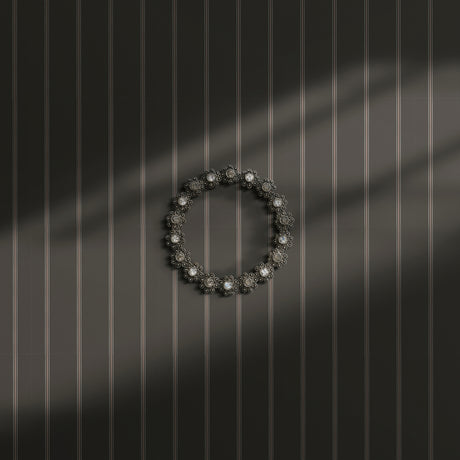Charcoal gray spotted striped wallpaper.