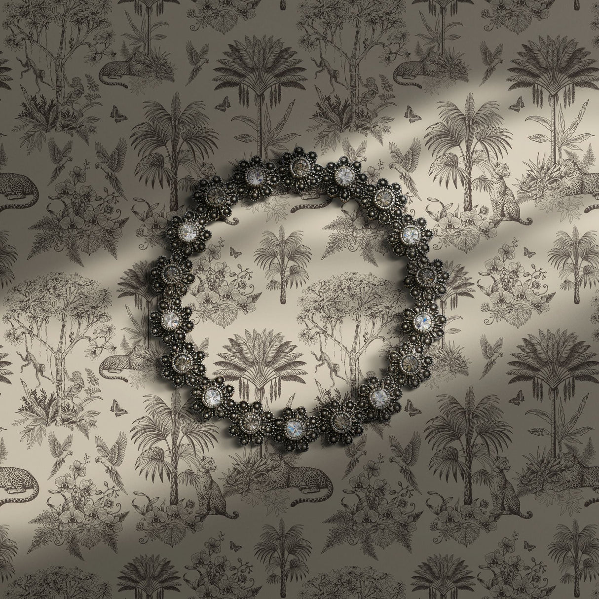 Cream and brown toile wallpaper featuring palm trees and jungle motifs.