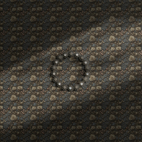 A dark and moody vintage floral wallpaper.