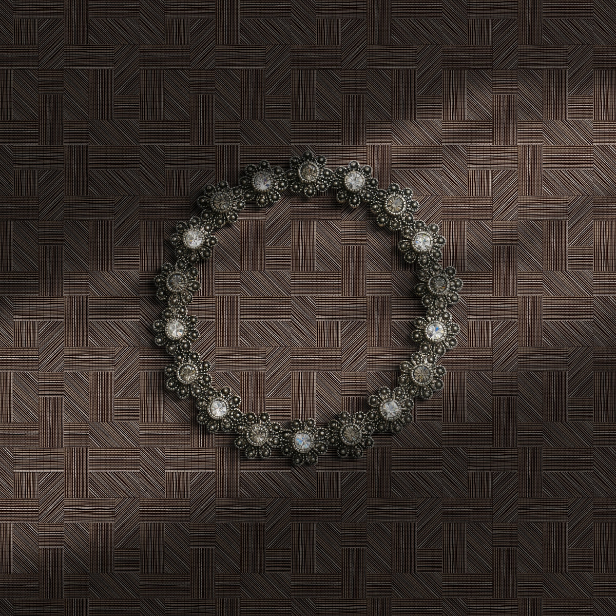 Dark brown geometrical wallpaper.