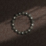 Dark brown geometrical wallpaper.
