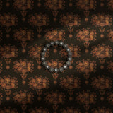 Moody dark brown floral wallpaper.