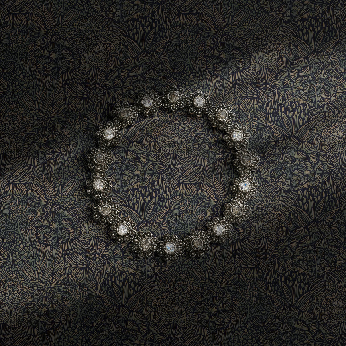 Dark moody blue botanical wallpaper.