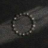 Dark moody blue botanical wallpaper.