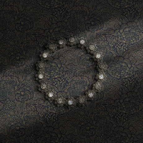 Dark moody blue botanical wallpaper.