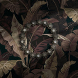 Dark and moody tropical wallpaper.