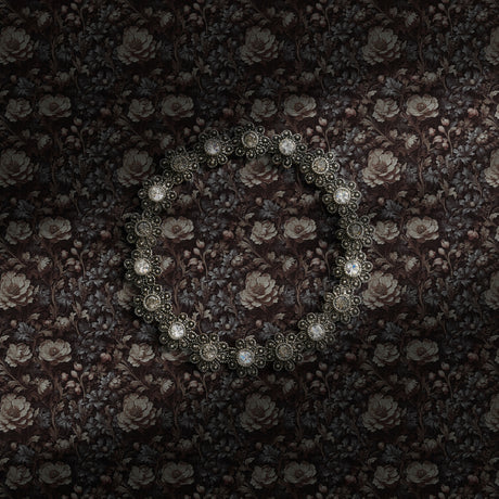 A dark and moody upscale vintage floral wallpaper.