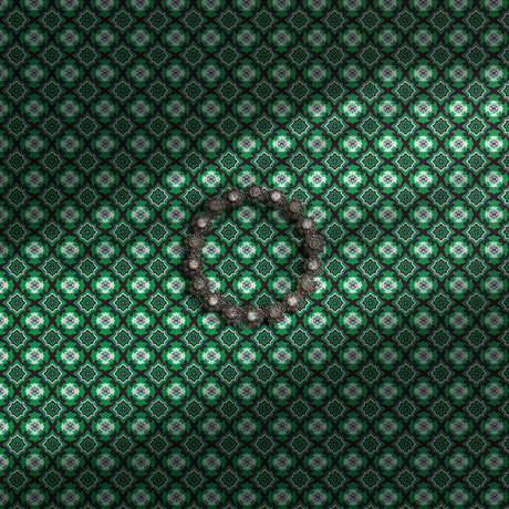 Funky green geometrical tiled wallpaper.