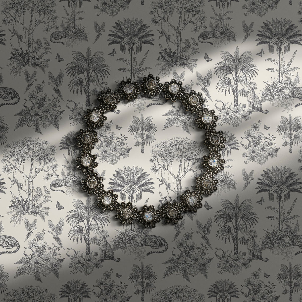 Gray and white tropical toile wallpaper.