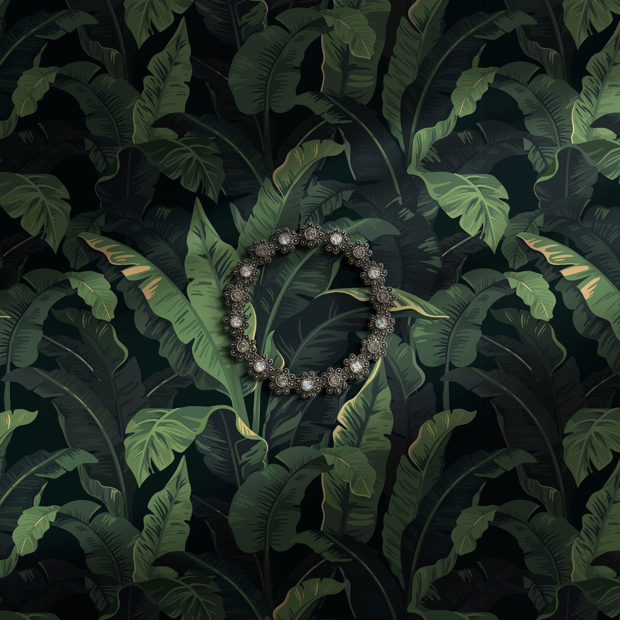 Large format green banana leaves wallpaper.