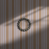 Light purple and orange striped wallpaper.