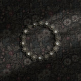 Moody gray dark academia floral wallpaper.