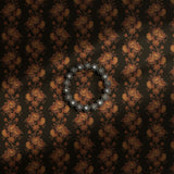 A dark and moody vintage floral wallpaper.