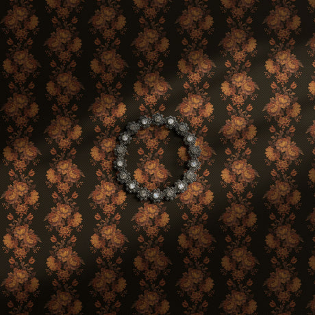 A dark and moody vintage floral wallpaper.