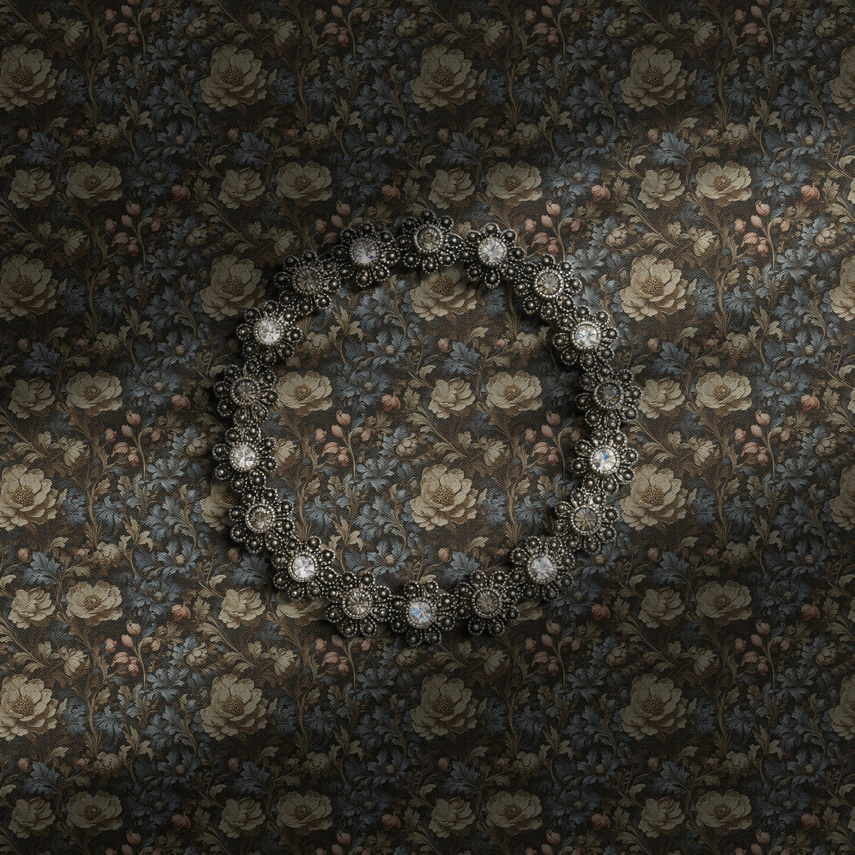 A muted old-world floral wallpaper.