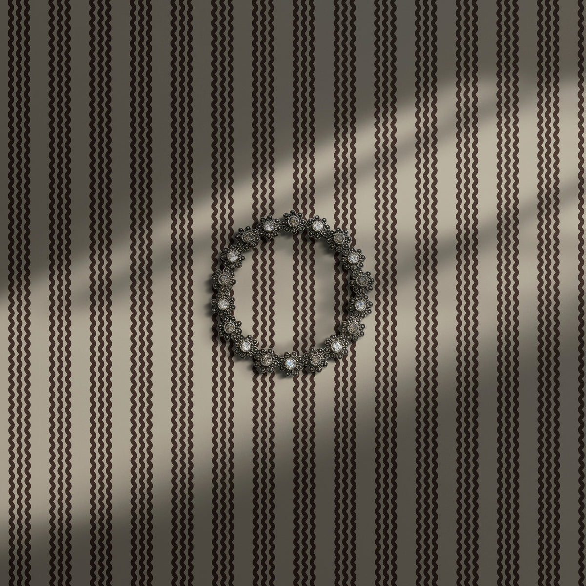 Neutral beige and brown wavy striped wallpaper.