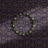 Purple damask wallpaper.