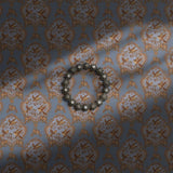 Light blue vintage wallpaper with antique-style birds, berries, and florals.