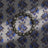 Vintage blue floral wallpaper on a light neutral background.