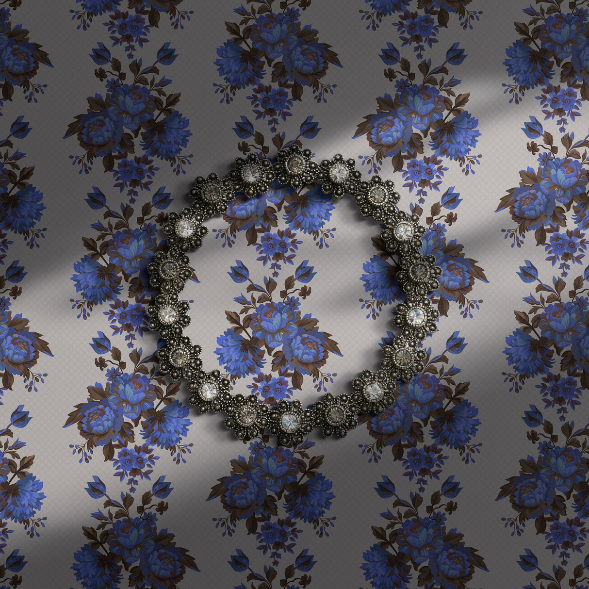 Vintage blue floral wallpaper on a light neutral background.