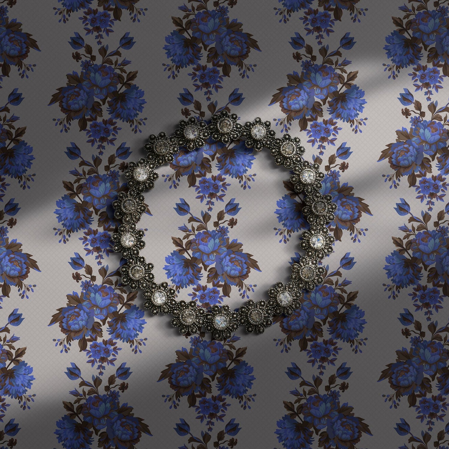 Vintage blue floral wallpaper on a light neutral background.