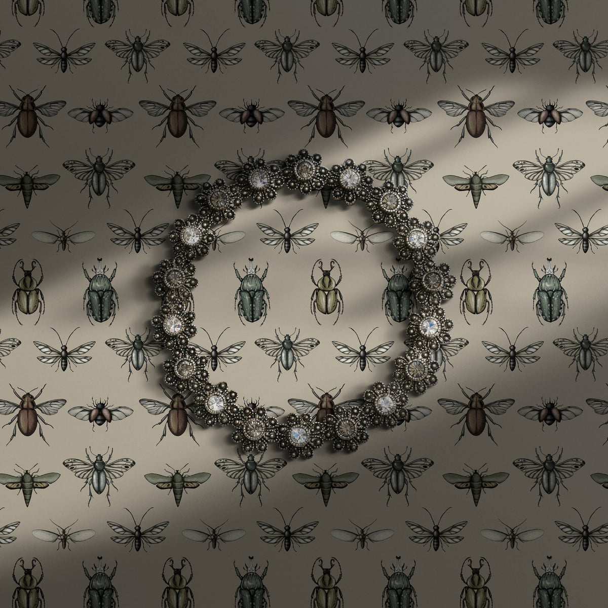 Vintage insect wallpaper on a cream background.