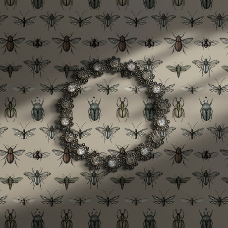Vintage insect wallpaper on a cream background.