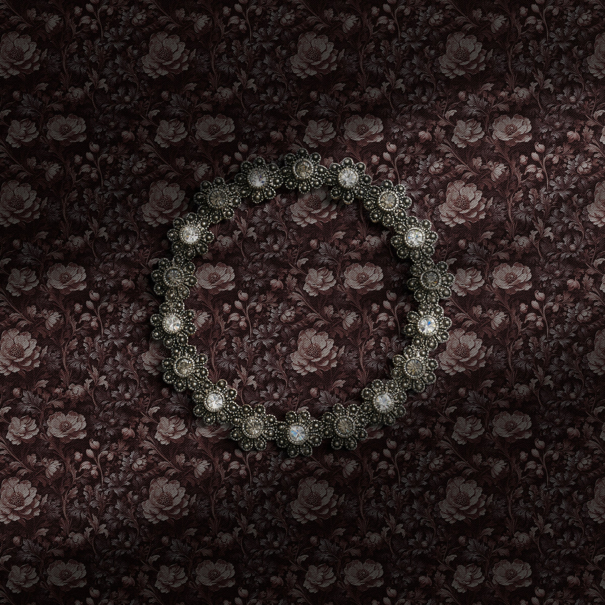 A warm dark academia floral wallpaper.
